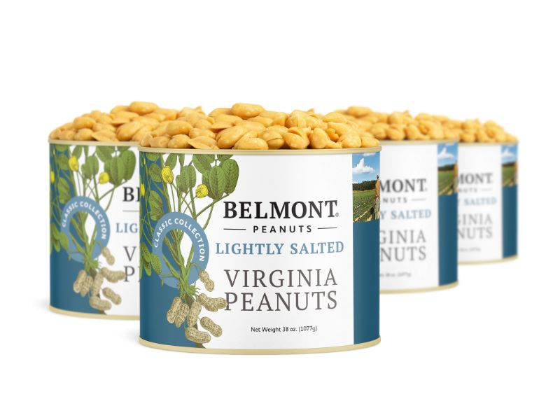 Four cans of Lightly Salted Virginia Peanuts, each filled with extra-large peanuts. The blue-labeled cans display elegant botanical designs, highlighting the premium quality of these lightly salted peanuts.