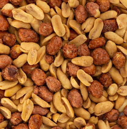 Close-up of Salted Caramel Butter Toffee Mixer, showcasing a tempting blend of roasted salted and honey roasted Virginia peanuts with rich textures and a golden-brown, buttery toffee color.