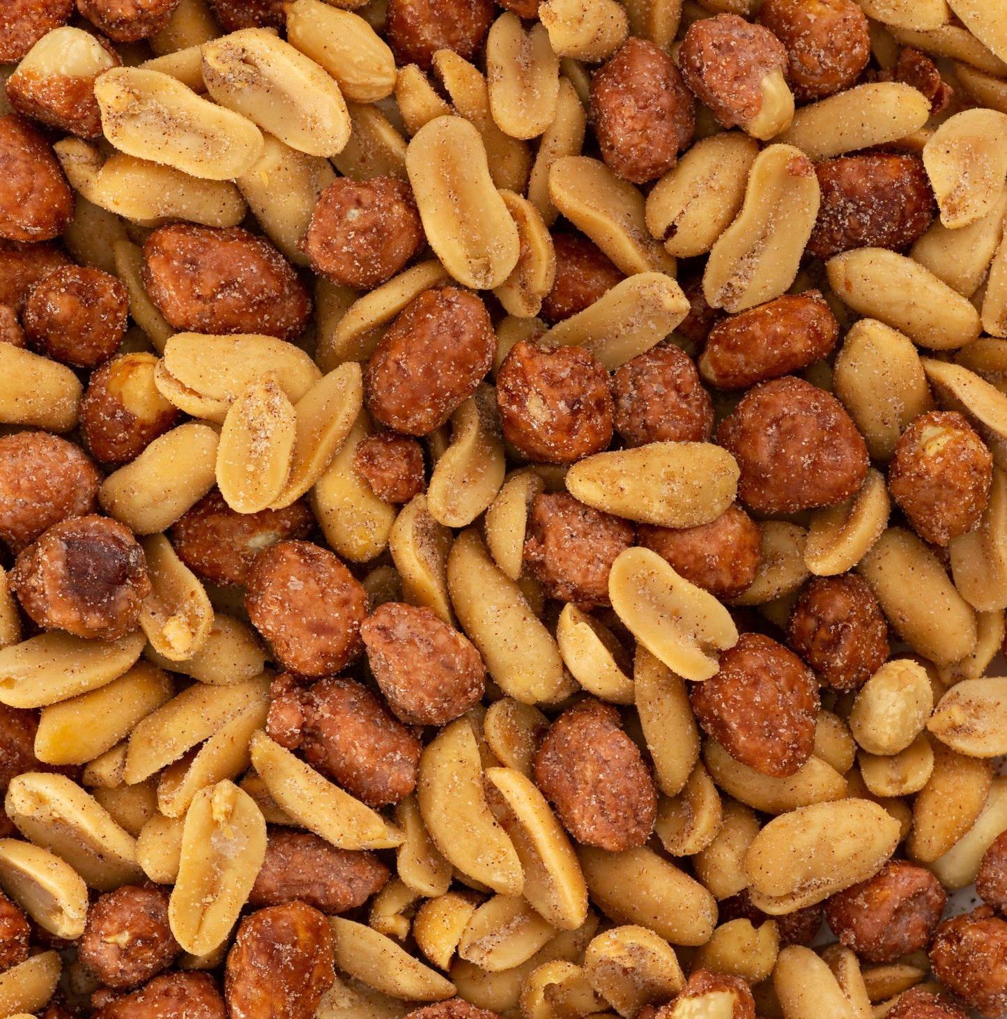A close-up of the Butter Toffee Mixers Sampler Pack showcases salted and honey-roasted peanuts, featuring both smooth and sugar-coated textures.