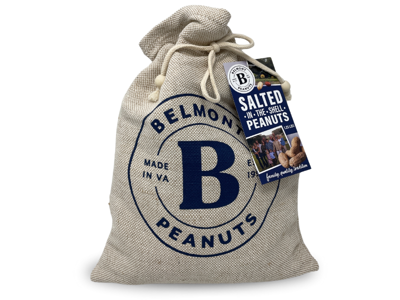 This burlap bag of Salted In-Shell Peanuts features a bold B logo, a tag reading "Salted In-The-Shell Peanuts," a drawstring closure, and an attached product info card.