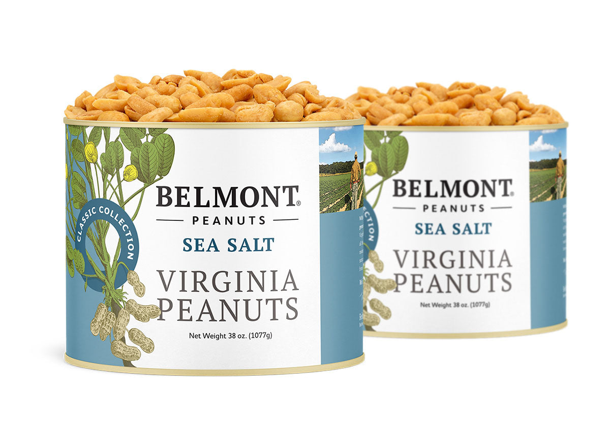 Two 38 oz cans of Belmont Peanuts Sea Salt, each filled with gourmet Virginia peanuts. The labels display peanut illustrations and text on a white and light blue background.