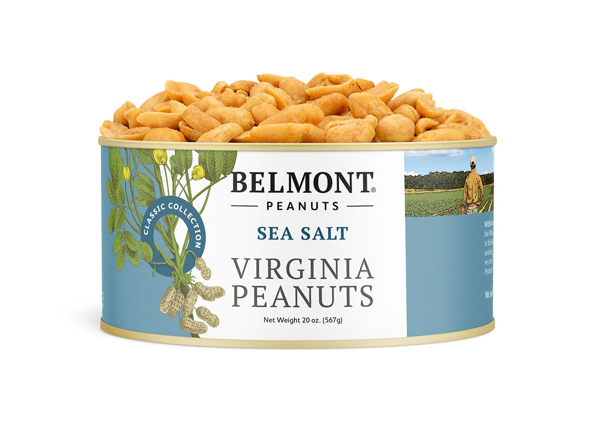 A tin container of Belmont brand Sea Salt Virginia Peanuts with a graphic of peanuts and a Virginia landscape.
