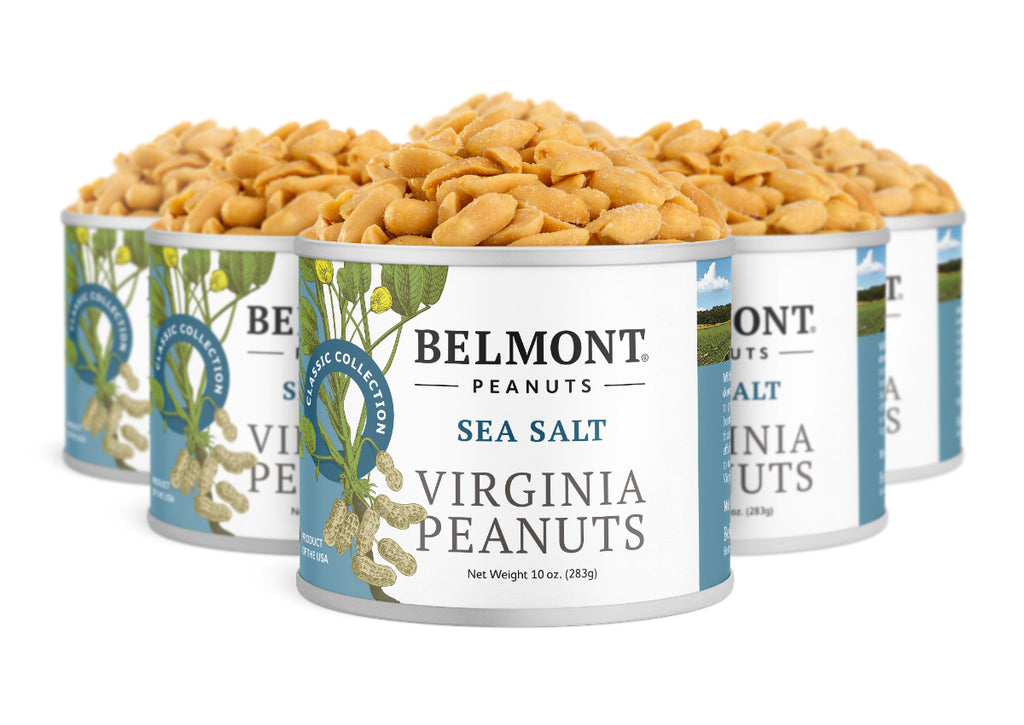 Five cans of Belmont Peanuts Sea Salt are grouped together. The blue and white labels show peanut plant graphics, highlighting these gourmet peanuts with a delicious sea salt flavor.