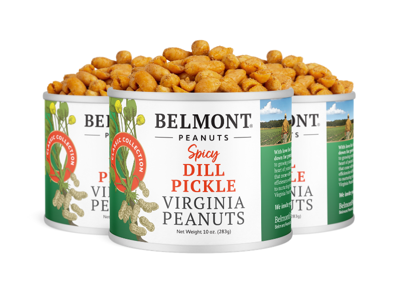 Three open cans of Spicy Dill Pickle peanuts show seasoned Virginia peanuts inside. The white labels with green and red accents emphasize this bold, spicy snack.
