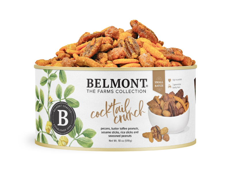 A round tin labeled Cocktail Crunch Mix holds pecans, seasoned peanuts, sesame sticks, and pretzel sticks. The label displays nut illustrations and a small bowl of the snack mix.