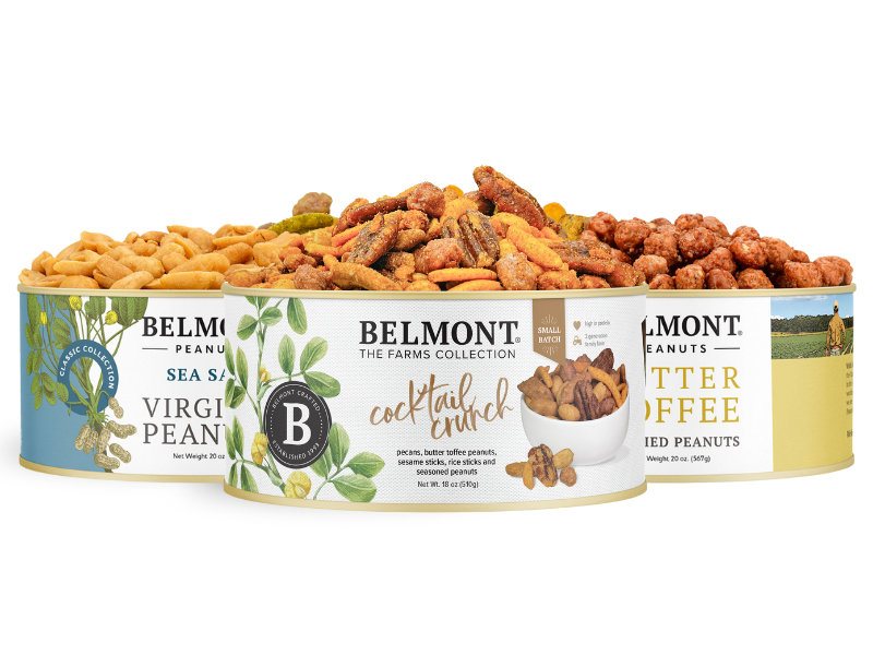 The Variety Trio features three Belmont Peanuts canisters: Cocktail Crunch Mix in front, with Sea Salt and Butter Toffee flavors displayed behind, all filled with Gourmet Virginia Peanuts and snacks in a handy sampler 3-pack.