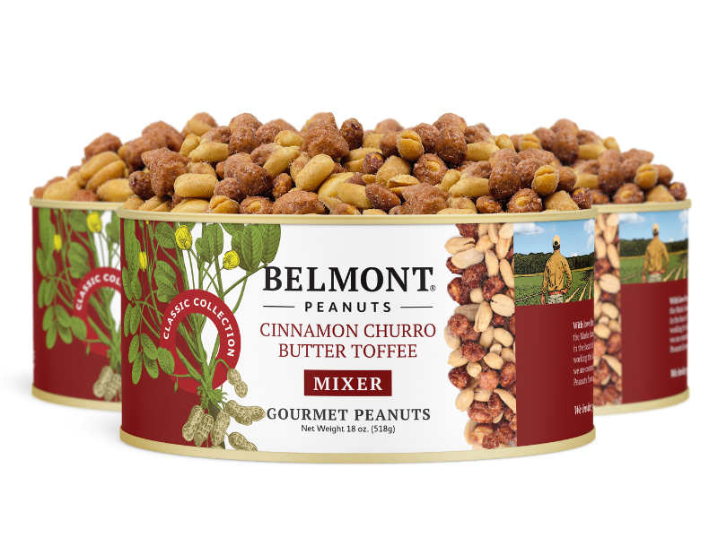 Three cans of Cinnamon Churro Butter Toffee Mixer are arranged together, featuring the classic collection label with tempting images and bold cinnamon flavor.