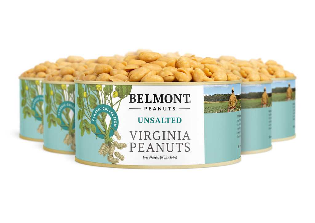 Four cans of Belmont Unsalted peanuts are grouped together. The blue and cream label features premium peanuts, green leaves, and a farmer, highlighting that no salt is added for pure, natural flavor.