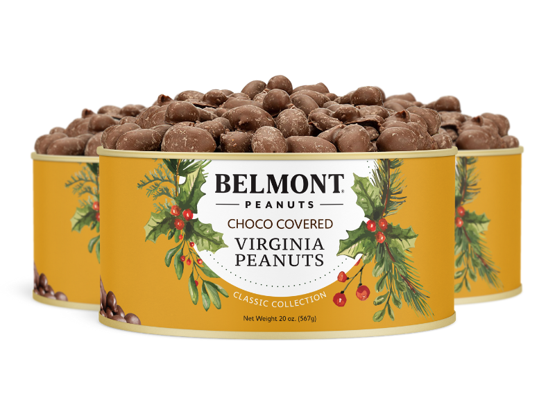 Three yellow tins of Holiday Chocolate Covered Peanuts feature gourmet Virginia peanuts coated in chocolate. The festive label with greenery and red berries makes them a perfect holiday gift.