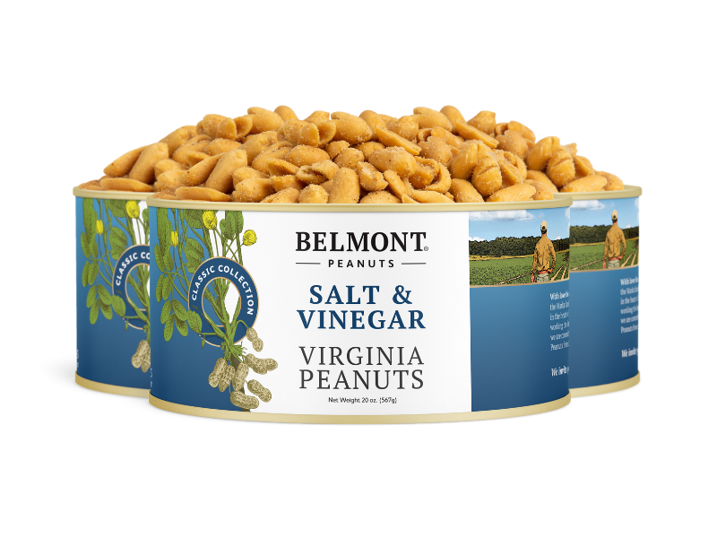 Three cans of Salt & Vinegar gourmet peanuts are arranged in a row. The front can's label features Virginia peanuts, a field illustration, and salted peanuts heaped on top.