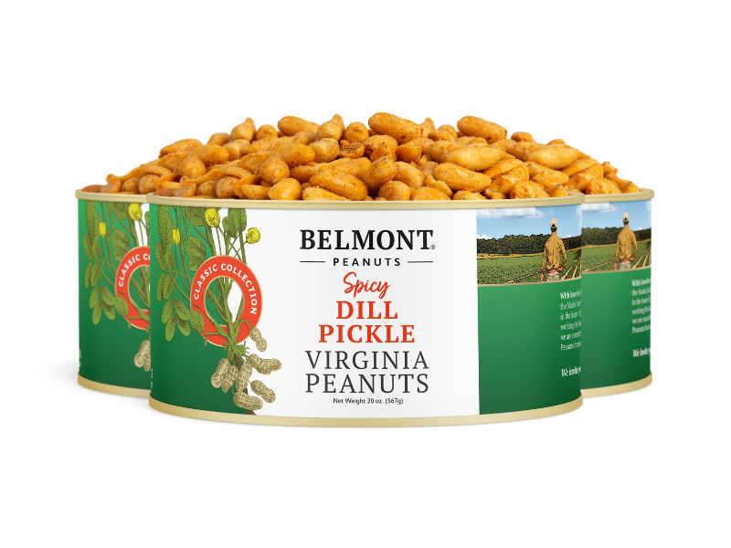 A can labeled Spicy Dill Pickle is filled to the top with bold, seasoned peanuts and features illustrations of peanut plants and a farm scene—a perfect choice for those craving a spicy snack.