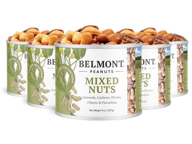 Four cans of Mixed Nuts, with almonds, cashews, pecans, filberts, and pistachios featured on the label and a gourmet nut assortment visible on top of each open can.
