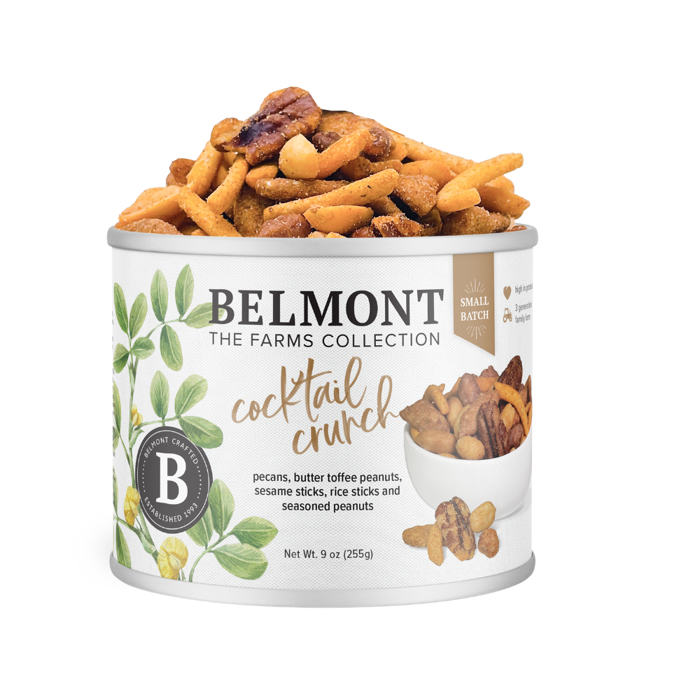 A can of Cocktail Crunch Mix, packed with pecans, butter toffee candied peanuts, sesame sticks, rice sticks, and seasoned peanuts. The leafy can design highlights the irresistible variety inside.