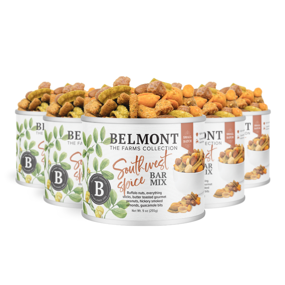 Five cans of Southwest Spice Bar Mix are arranged in a staggered row, each featuring an image of the snack mix and a leafy design on a clean white background.